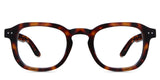 Zuri Eyeglasses in caretta variant - it's a narrow frame in tortoise pattern 